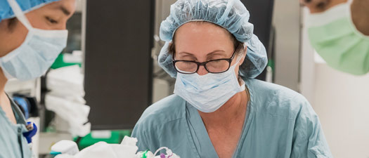 Anesthesiologist attending in operating room